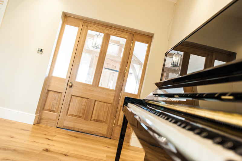 A timber bespoke door in a feature property in Bath