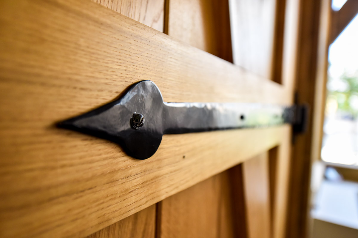 An oak panelled internal bespoke door fitted to a property in Bristol